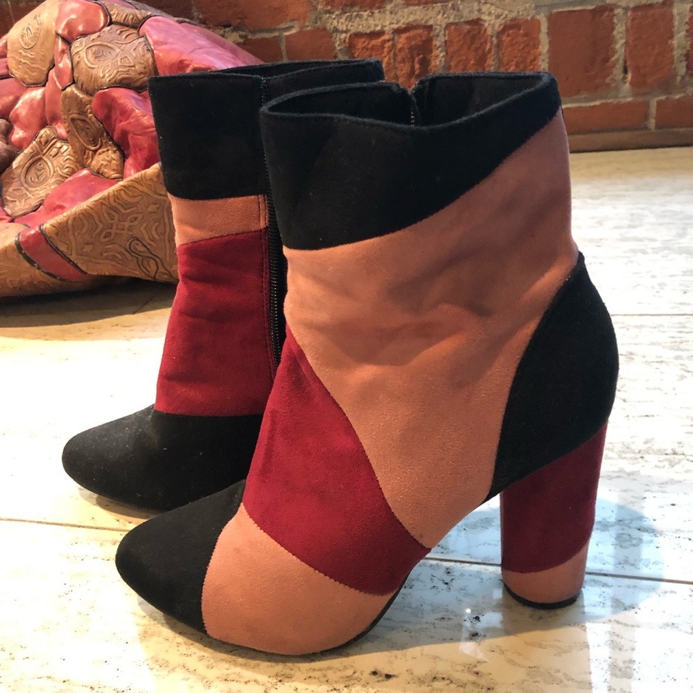 Faux suede color block chunky heel ankle boot.